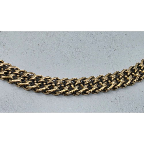 24 - An unmarked yellow metal flat fancy link necklace 44 cm 35.5 g