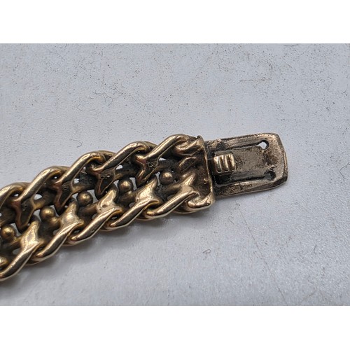 24 - An unmarked yellow metal flat fancy link necklace 44 cm 35.5 g