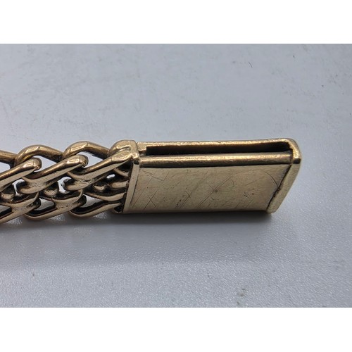 24 - An unmarked yellow metal flat fancy link necklace 44 cm 35.5 g