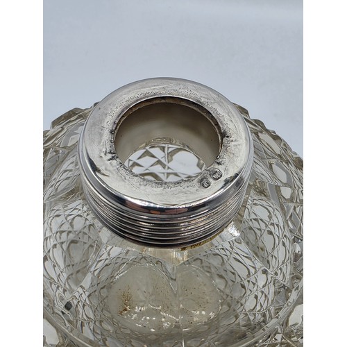 22 - A collection of sterling silver items to include small sauceboat, silver topped glass scent bottle &... 