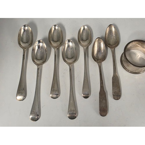 33 - A collection of sterling silver tea spoons with two sterling napkin rings 178 g