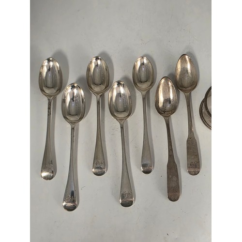 33 - A collection of sterling silver tea spoons with two sterling napkin rings 178 g