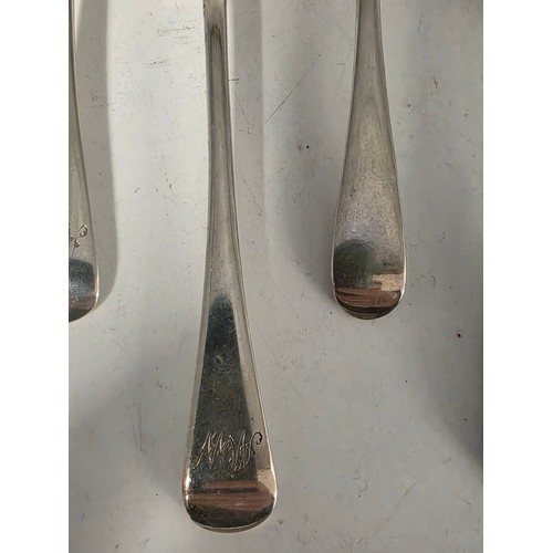 33 - A collection of sterling silver tea spoons with two sterling napkin rings 178 g