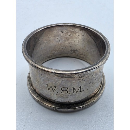 33 - A collection of sterling silver tea spoons with two sterling napkin rings 178 g