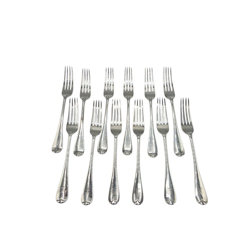 30 - A set of twelve sterling silver dining forks by Goldsmith and Silversmith Company London 1905.  775 ... 
