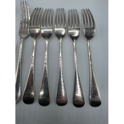 30 - A set of twelve sterling silver dining forks by Goldsmith and Silversmith Company London 1905.  775 ... 