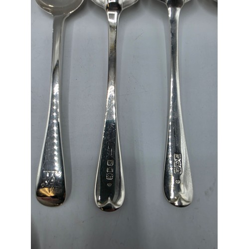 28 - A collection of sterling silver flatware, to include 8 desert forks, 12 desert spoons, 11 serving sp... 