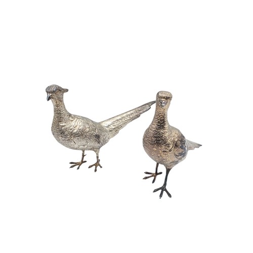 34 - Two sterling silver mounted  table Pheasants 13 cm x 22 cm. By Richard Lawton Ltd, London. 1986 (sil... 