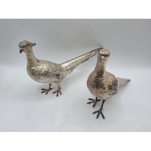 34 - Two sterling silver mounted  table Pheasants 13 cm x 22 cm. By Richard Lawton Ltd, London. 1986 (sil... 