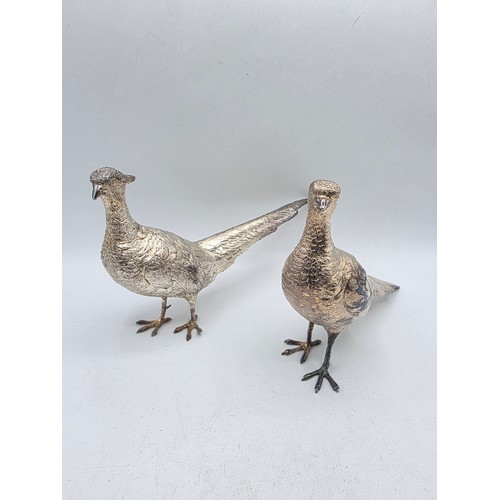 34 - Two sterling silver mounted  table Pheasants 13 cm x 22 cm. By Richard Lawton Ltd, London. 1986 (sil... 