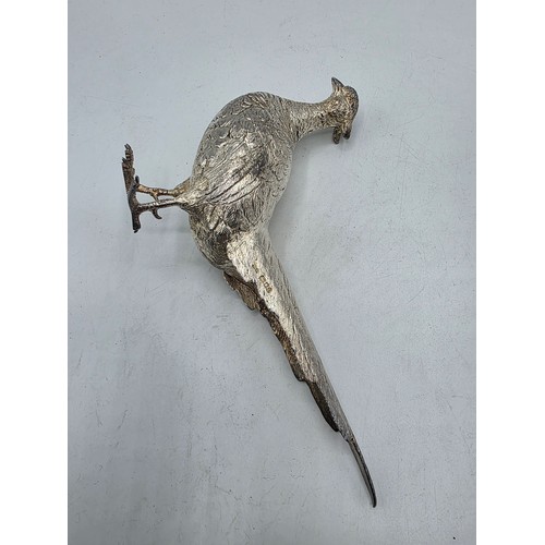 34 - Two sterling silver mounted  table Pheasants 13 cm x 22 cm. By Richard Lawton Ltd, London. 1986 (sil... 