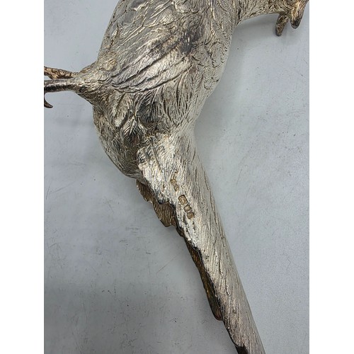 34 - Two sterling silver mounted  table Pheasants 13 cm x 22 cm. By Richard Lawton Ltd, London. 1986 (sil... 