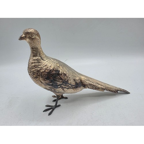 34 - Two sterling silver mounted  table Pheasants 13 cm x 22 cm. By Richard Lawton Ltd, London. 1986 (sil... 