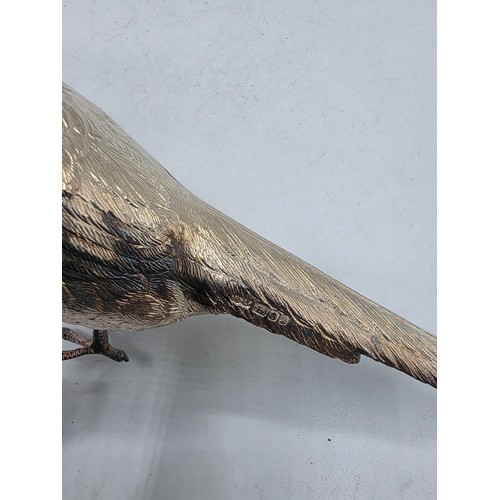 34 - Two sterling silver mounted  table Pheasants 13 cm x 22 cm. By Richard Lawton Ltd, London. 1986 (sil... 