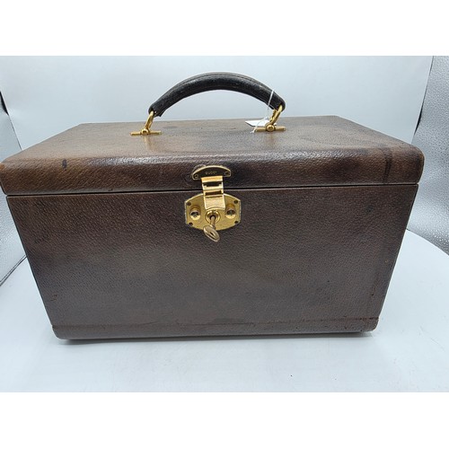 23 - A vintage Gucci leather jewellery travel case with green felt lined interior 34 cm x 19 cm x 20 cm H