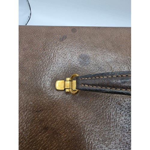 23 - A vintage Gucci leather jewellery travel case with green felt lined interior 34 cm x 19 cm x 20 cm H