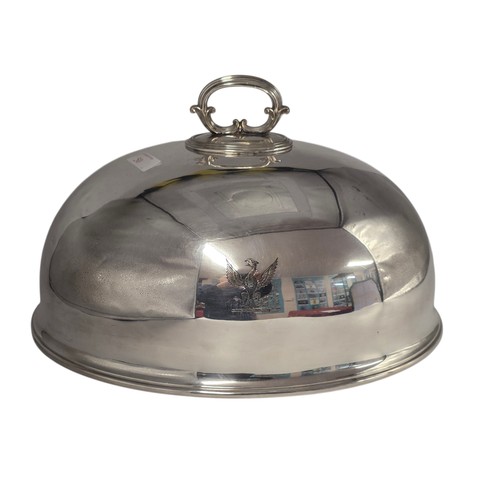 50 - A collection of silver plated wares to include a large cloche.