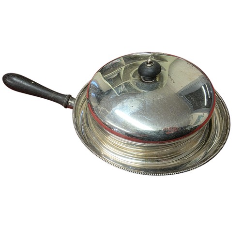 50 - A collection of silver plated wares to include a large cloche.