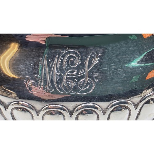 43 - A Scottish sterling silver three piece tea set with half fluted design on ball feet. By James McKay,... 