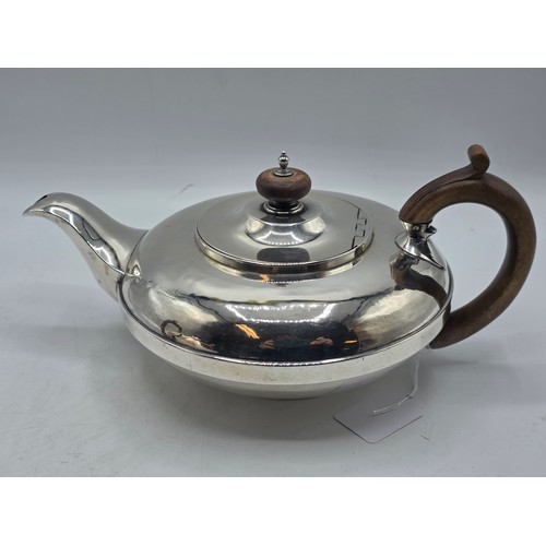 37 - A pair of Georgian sterling silver teapots of squashed globular form, by  WE, London, 1831. 1296g.