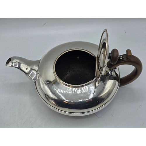 37 - A pair of Georgian sterling silver teapots of squashed globular form, by  WE, London, 1831. 1296g.