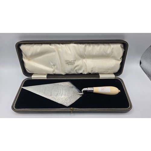57 - A sterling silver presentation trowel, Walter and John Barnard in velvet lined presentation box 1888... 