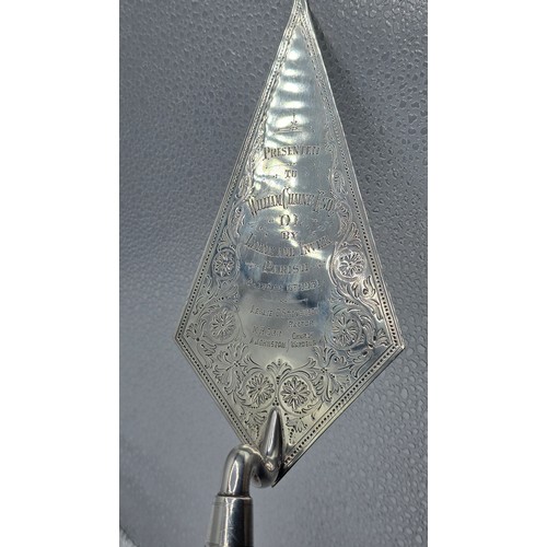 57 - A sterling silver presentation trowel, Walter and John Barnard in velvet lined presentation box 1888... 
