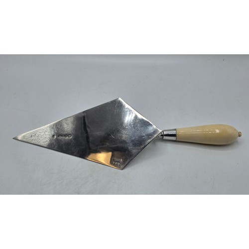 57 - A sterling silver presentation trowel, Walter and John Barnard in velvet lined presentation box 1888... 