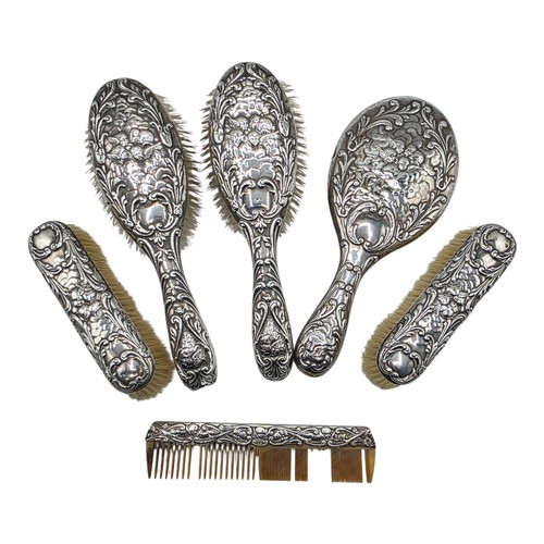 41 - A sterling silver mounted travel dressing table set in blue velvet lined leather covered box, by Hor... 