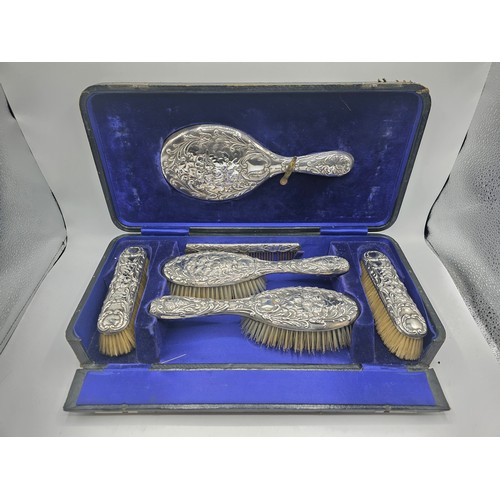 41 - A sterling silver mounted travel dressing table set in blue velvet lined leather covered box, by Hor... 