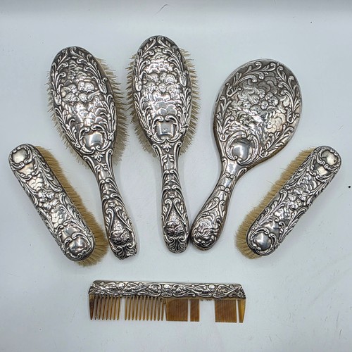 41 - A sterling silver mounted travel dressing table set in blue velvet lined leather covered box, by Hor... 