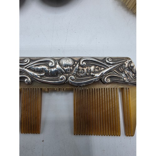 41 - A sterling silver mounted travel dressing table set in blue velvet lined leather covered box, by Hor... 