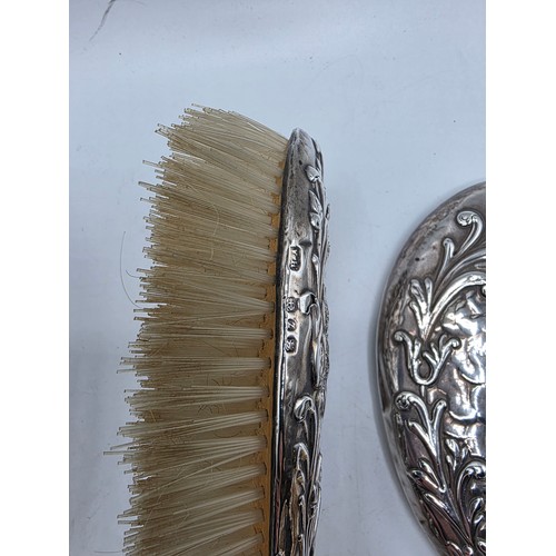 41 - A sterling silver mounted travel dressing table set in blue velvet lined leather covered box, by Hor... 