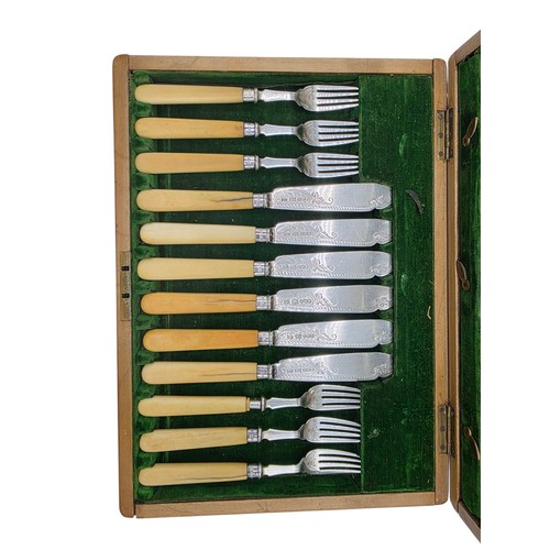 42 - A sterling silver and composite handled boxed 12 person fish knives and forks. JR Birmingham 1881.