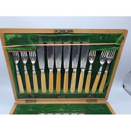 42 - A sterling silver and composite handled boxed 12 person fish knives and forks. JR Birmingham 1881.