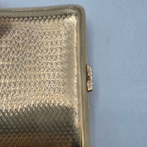 39 - A 9ct gold hip shaped cigarette case with engine turned decoration. By William Neale Birmingham 1899... 