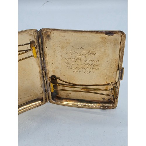 39 - A 9ct gold hip shaped cigarette case with engine turned decoration. By William Neale Birmingham 1899... 