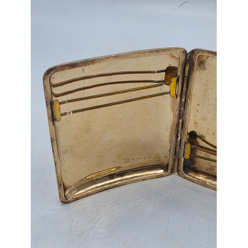 39 - A 9ct gold hip shaped cigarette case with engine turned decoration. By William Neale Birmingham 1899... 