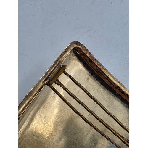 39 - A 9ct gold hip shaped cigarette case with engine turned decoration. By William Neale Birmingham 1899... 