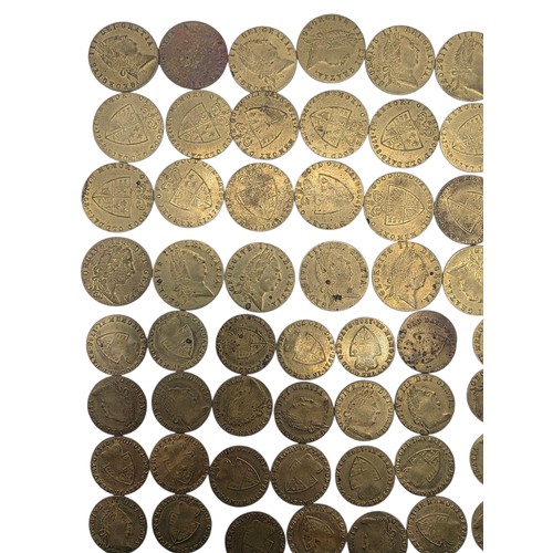 126 - A collection of George III half and full guinea spade gaming tokens.