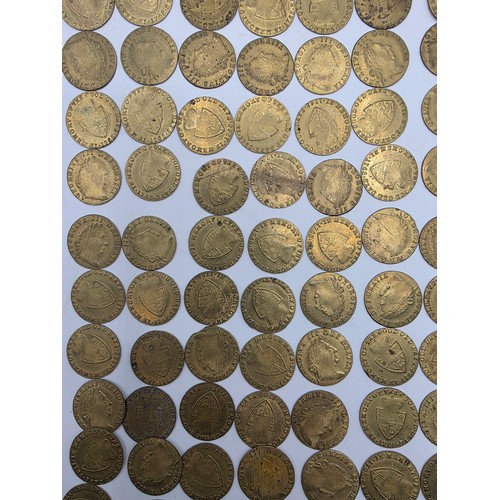 126 - A collection of George III half and full guinea spade gaming tokens.
