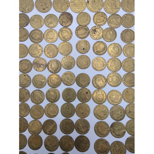 126 - A collection of George III half and full guinea spade gaming tokens.