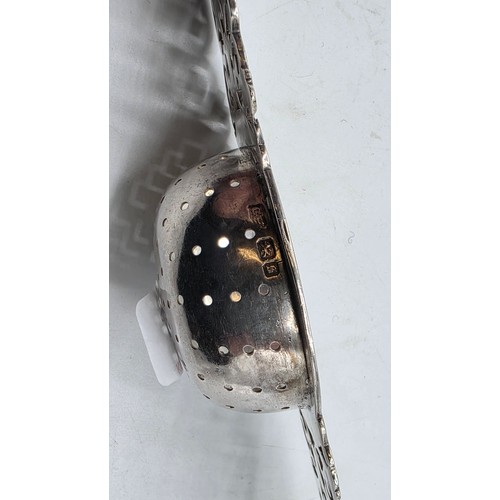 56 - A collection of white metal beakers and a Dunhill white metal engine turned cigarette lighter togeth... 