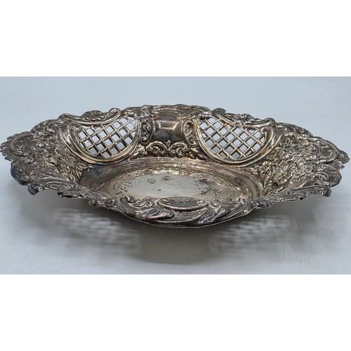 47 - Three sterling silver items to include a pierced dish etc, various dates and makers. 135g