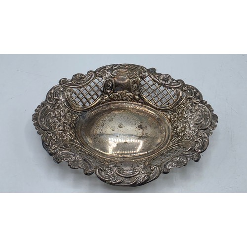 47 - Three sterling silver items to include a pierced dish etc, various dates and makers. 135g