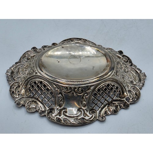47 - Three sterling silver items to include a pierced dish etc, various dates and makers. 135g