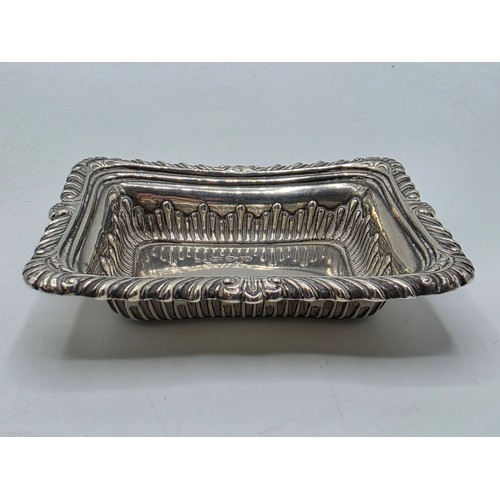 47 - Three sterling silver items to include a pierced dish etc, various dates and makers. 135g