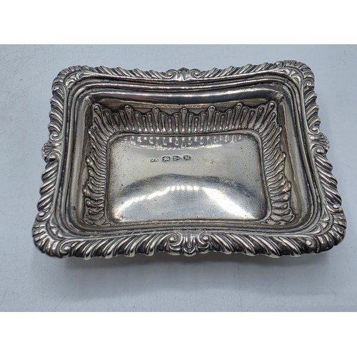 47 - Three sterling silver items to include a pierced dish etc, various dates and makers. 135g