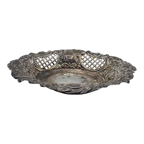 47 - Three sterling silver items to include a pierced dish etc, various dates and makers. 135g