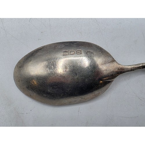 55 - A boxed set of sterling silver cake forks together with a boxed sterling silver christening spoon an... 